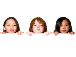 photo of three children peering over a barrier