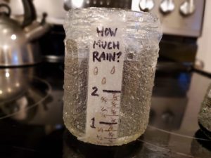 full jar after measuring rainfall