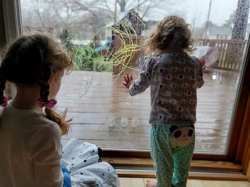 children watching the rain