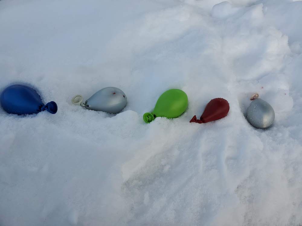 image of water balloons in the snow