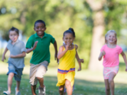 photo of kids running outside