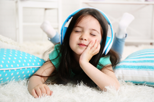 image of a little girl with headphones